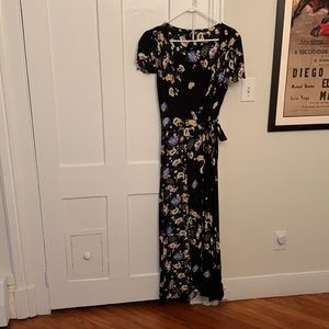 A long, black, flower Free People dress